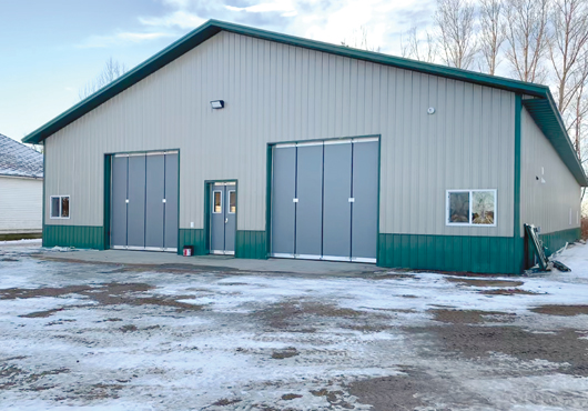 FINDOOR Industrial Inc. is known for its unique folding doors, pictured here. The energy-efficient, weathertight doors are ideal for cold climates.